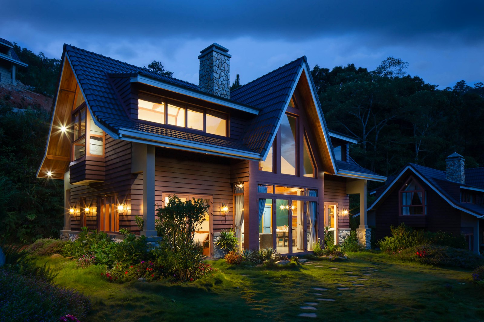 Warmly lit family home at dusk